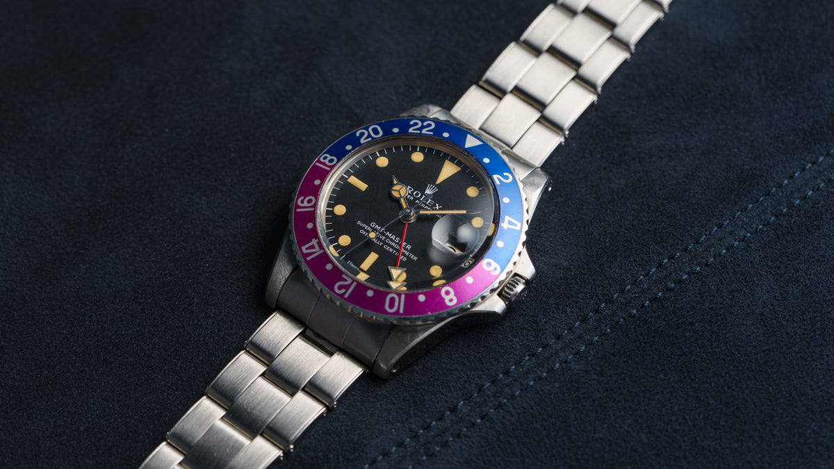 1675, GMT-Master, Fuchsia Bezel, Steel