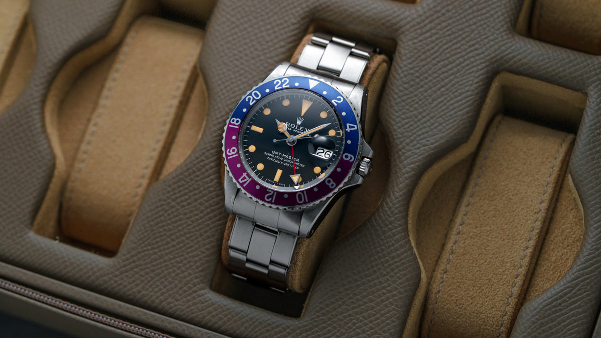 1675, GMT-Master, Fuchsia Bezel, Steel