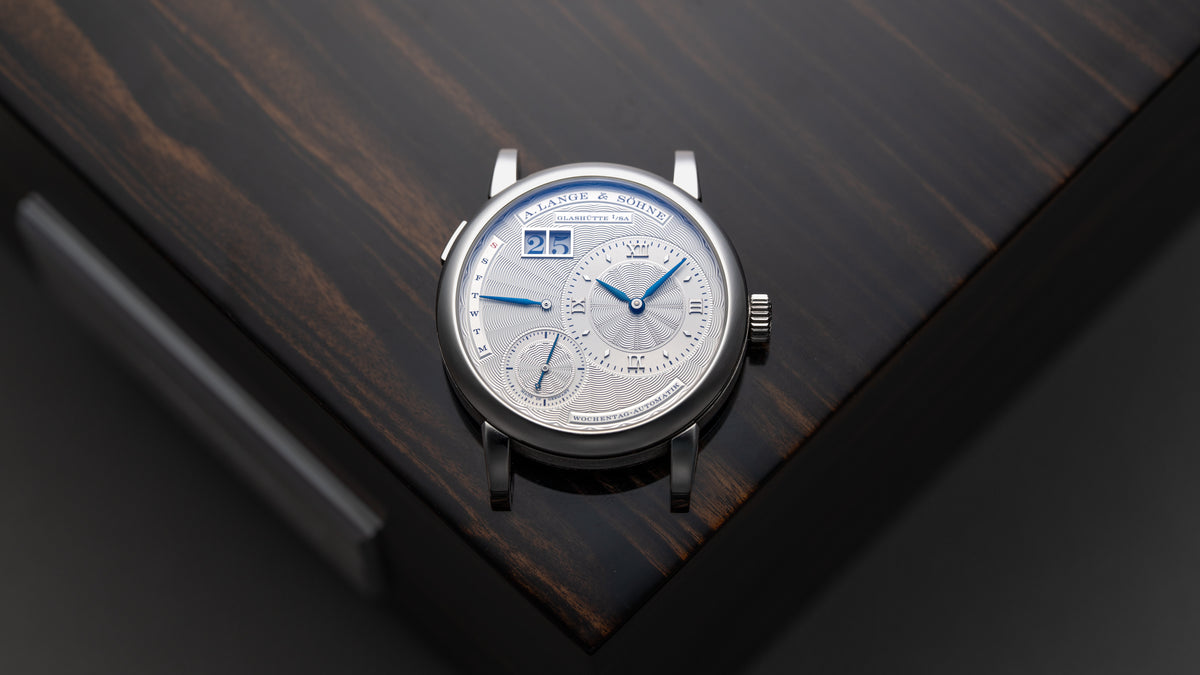 320.040,  Lange 1 Daymatic, Tokyo Boutique Edition, White Gold