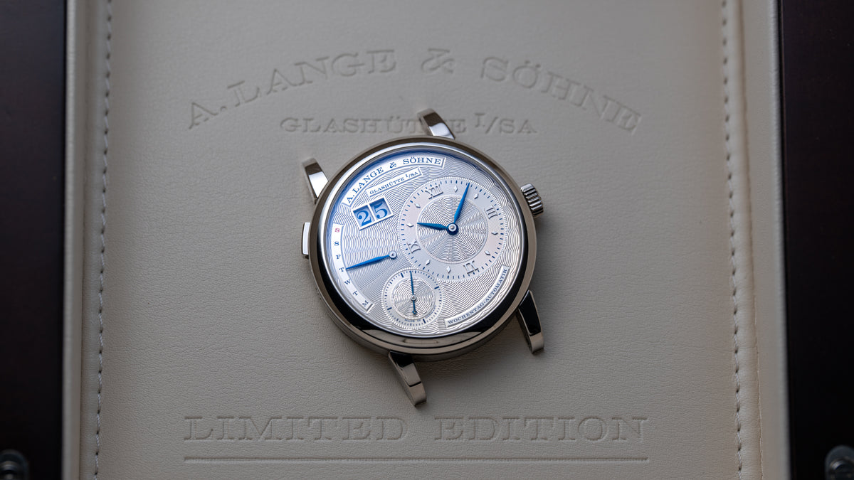 320.040,  Lange 1 Daymatic, Tokyo Boutique Edition, White Gold