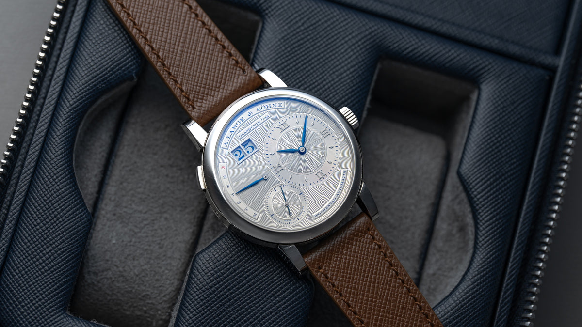 320.040,  Lange 1 Daymatic, Tokyo Boutique Edition, White Gold