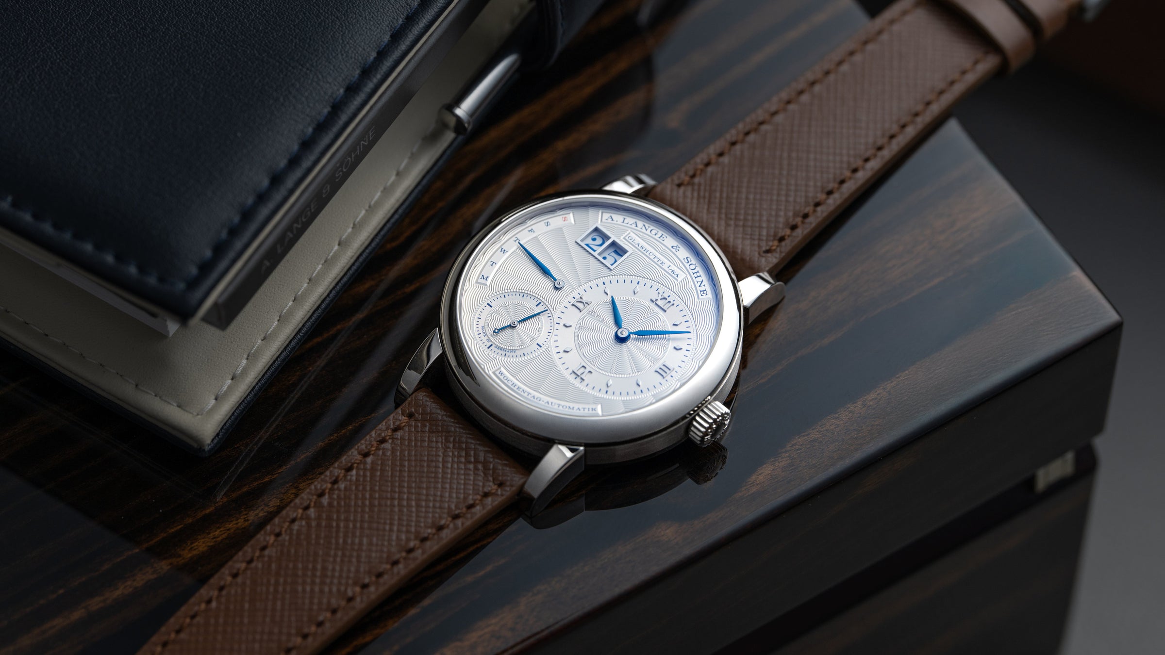 320.040,  Lange 1 Daymatic, Tokyo Boutique Edition, White Gold